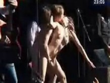 Naughty couple fucking on stage during a concert