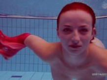 Redhead in the pool